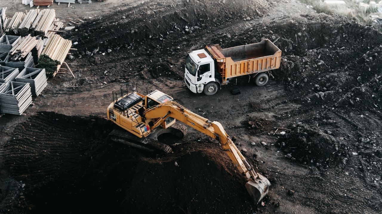 Mastering the First Impression: Your intriguing post title goes here Dump truck and excavator at an industrial construction site in Istanbul, Turkey.